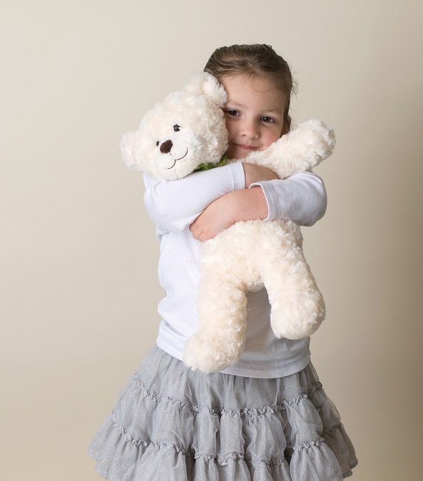 orig-little-girl-holding-a-teddy-bear